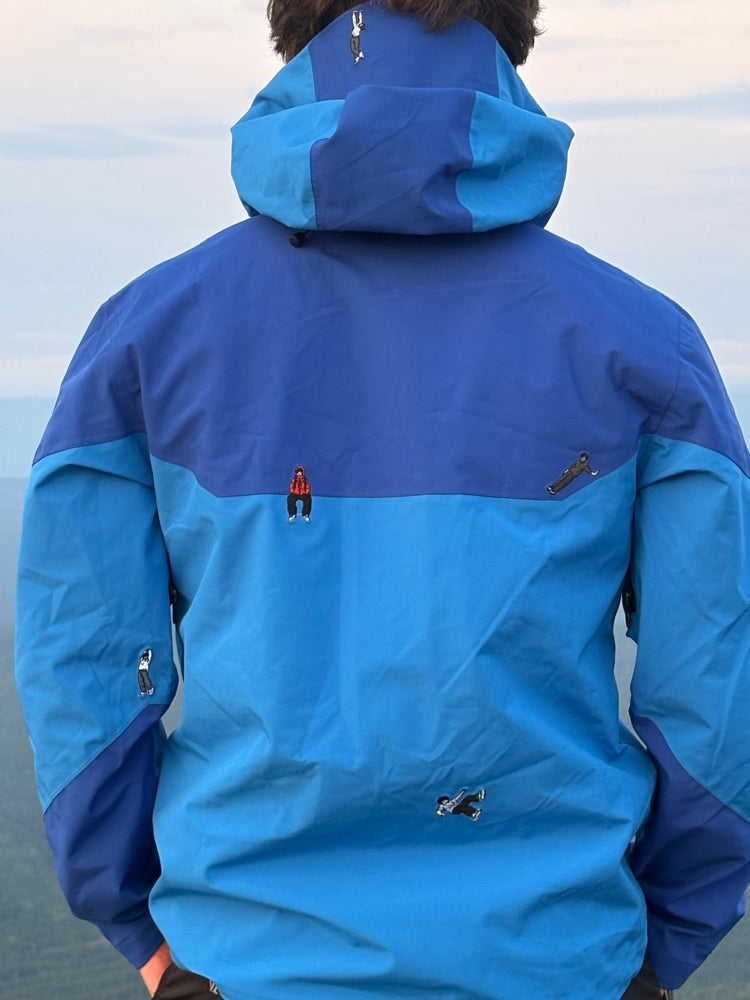 The Shell Jacket from the back, hood up